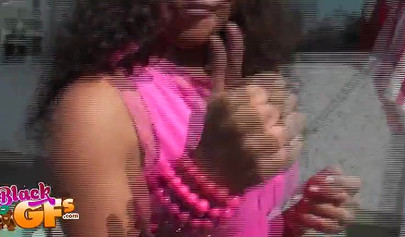 Ebony babe goes bowling and is seduced by a white dude to show and flash her tits