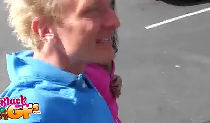 Ebony babe goes bowling and is seduced by a white dude to show and flash her tits