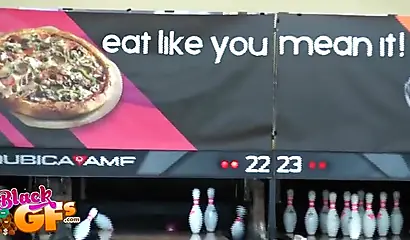 Ebony babe goes bowling and is seduced by a white dude to show and flash her tits