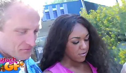 Ebony babe goes bowling and is seduced by a white dude to show and flash her tits