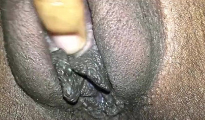 Close up video of a black cock entering a black pussy hard with her legs spread
