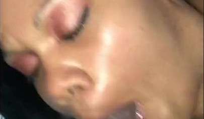 Slutty black whore in fishnet stockings loves sucking cock and getting a facial