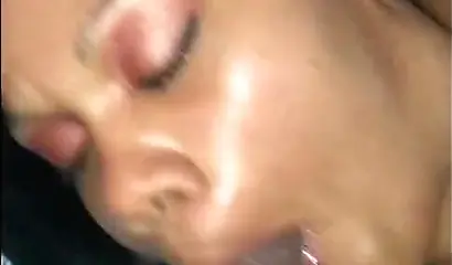 Slutty black whore in fishnet stockings loves sucking cock and getting a facial