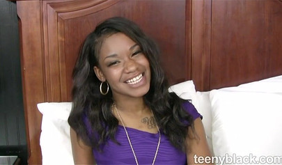 Hot black woman in purple dress shows us her skills when it comes to sucking cock