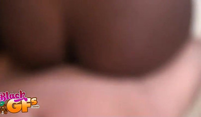 Luscious black chick slobbers on a hard white rod before taking it in her pussy