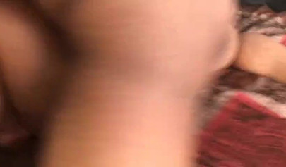 Dazzling ebony girl sucks a black cock while another drills her in a threesome