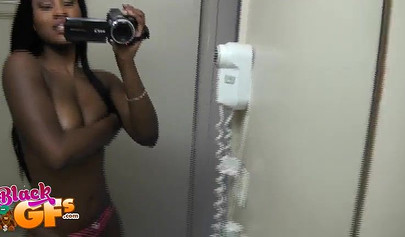 Sexy black amateur babe records herself teasing with her body in front of a mirror