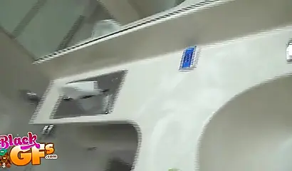 Sexy black amateur babe records herself teasing with her body in front of a mirror