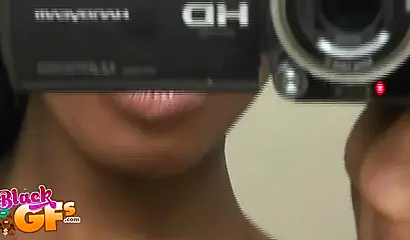 Sexy black amateur babe records herself teasing with her body in front of a mirror