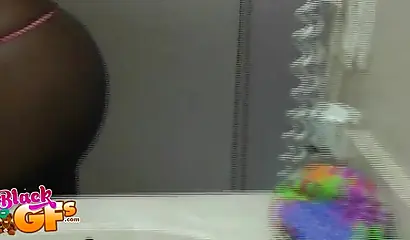 Sexy black amateur babe records herself teasing with her body in front of a mirror