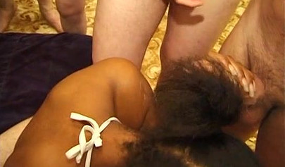 Ebony slut sucks ten cocks in one go like whore