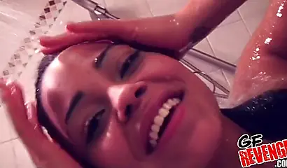 Ebony babe showers and gets filmed while doing it too