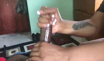 Black babe shows us how to jerk off her boyfriend