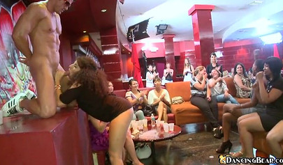 Black babe with curly hair sucks cock while at party