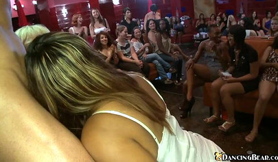 Black babe with curly hair sucks cock while at party