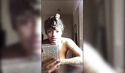 Thick black girl shakes her fat ass cheeks and also her massive thick titties