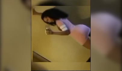 A big booty black girl shakes those phat cheeks and titties for her audience
