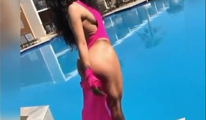 A big booty black girl shakes those phat cheeks and titties for her audience