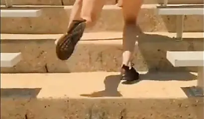 A big booty black girl shakes those phat cheeks and titties for her audience