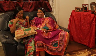 Two thick ebony girls experiment with their bodies and some colorful dildos