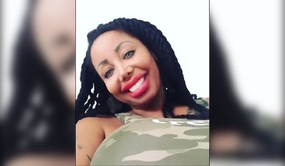 Black chick with implants shows her massive titties and loves the feeling of it