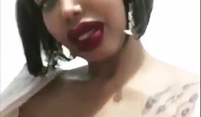 Black chick with implants shows her massive titties and loves the feeling of it