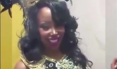 Black chick with implants shows her massive titties and loves the feeling of it