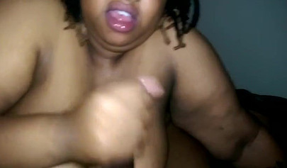 Fat ebony chick swirls her tongue around a fat dick and gives a good blowjob