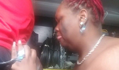 Black redhead eats up that big fat dick and moans for her man for his pleasure