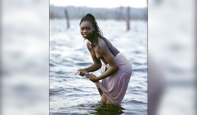 Hot black girls get their tight pussies put on display for the camera and smile