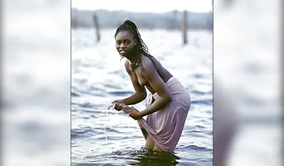 Hot black girls get their tight pussies put on display for the camera and smile