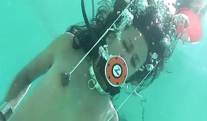 Skinny ebony vixen is hogtied underwater and exposed completely naked for cam