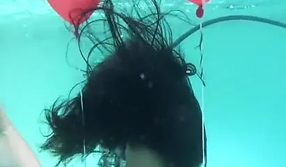 Skinny ebony vixen is hogtied underwater and exposed completely naked for cam