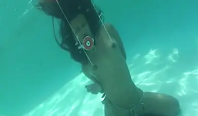 Skinny ebony vixen is hogtied underwater and exposed completely naked for cam