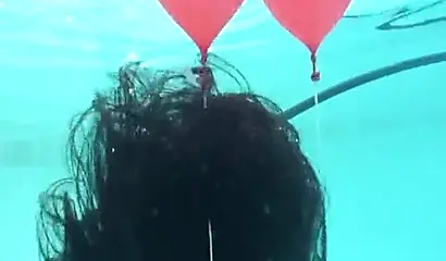 Skinny ebony vixen is hogtied underwater and exposed completely naked for cam