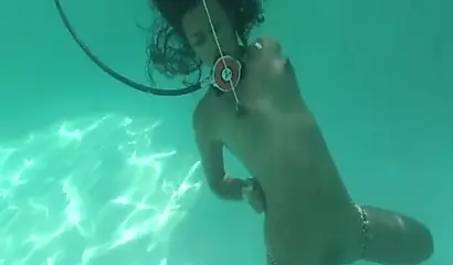 Skinny ebony vixen is hogtied underwater and exposed completely naked for cam