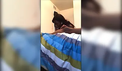 Dashing ebony teenie gives a long and sloppy erotic blowjob to a big black cock