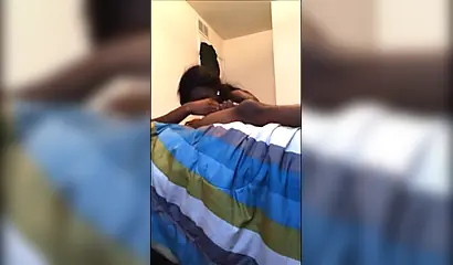 Dashing ebony teenie gives a long and sloppy erotic blowjob to a big black cock