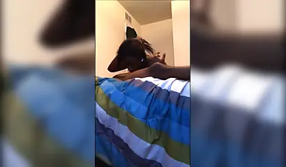 Dashing ebony teenie gives a long and sloppy erotic blowjob to a big black cock