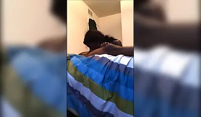 Dashing ebony teenie gives a long and sloppy erotic blowjob to a big black cock