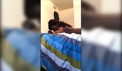 Dashing ebony teenie gives a long and sloppy erotic blowjob to a big black cock