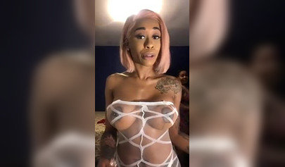 Dashing ebony Instagram model with pink hair teases with her perfect tattooed body