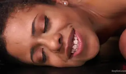 Kinky ebony Kira Noir tied up before having both of her holes fucked with toys