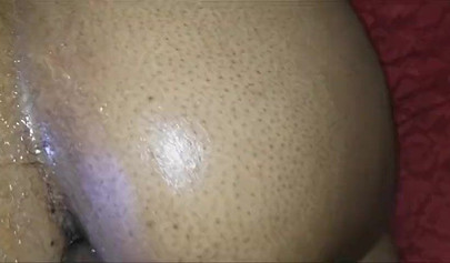 Amateur ebony MILF slobbers on a big black cock before taking it in her tight ass