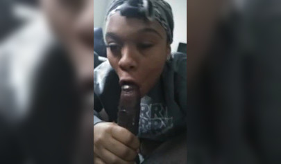 Luscious ebony babe pleasures a big black cock with a long and sloppy blowjob