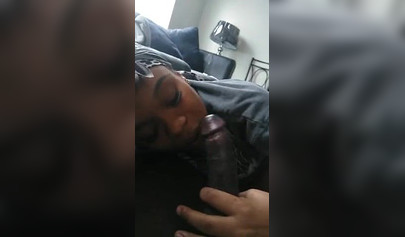 Luscious ebony babe pleasures a big black cock with a long and sloppy blowjob