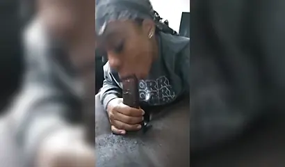 Luscious ebony babe pleasures a big black cock with a long and sloppy blowjob