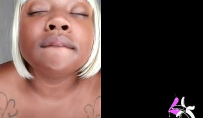 Chubby black amateur chick strips naked and shows off her massive tits on camera