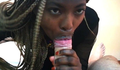 Adorable black ebony teen with small tits gives a sloppy blowjob before riding