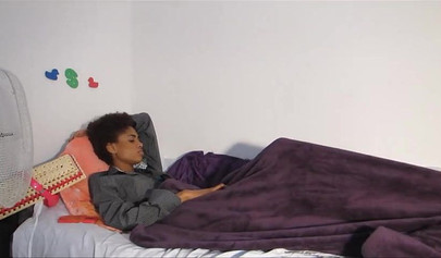 Skinny ebony chick with curly hair pleases herself with her fingers and a dildo